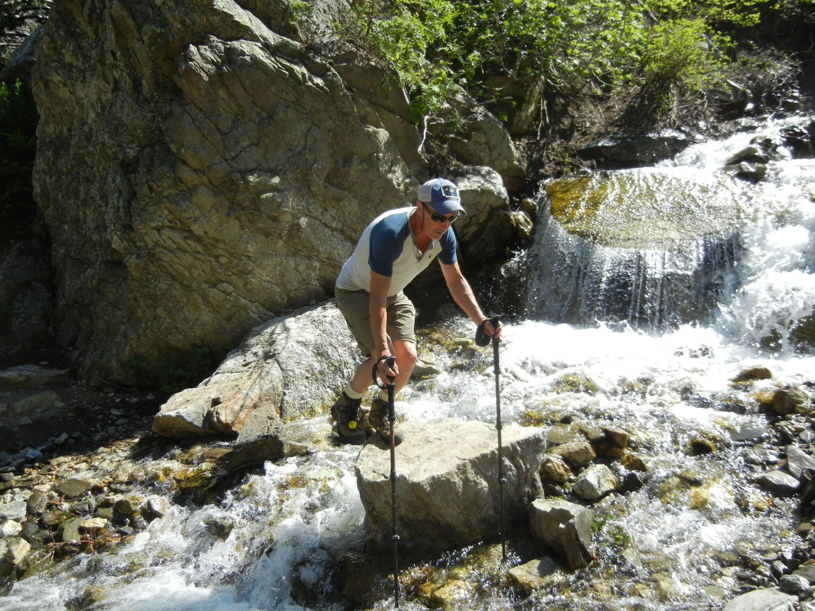 Warren Lance Wise crossing rock-covered stream